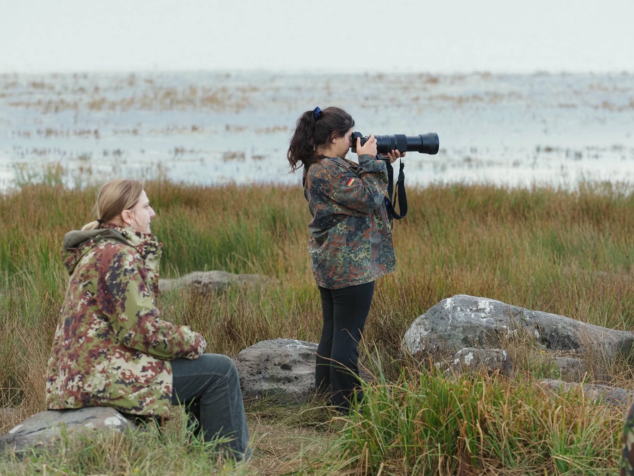 Two GWPA members photographing by the lake